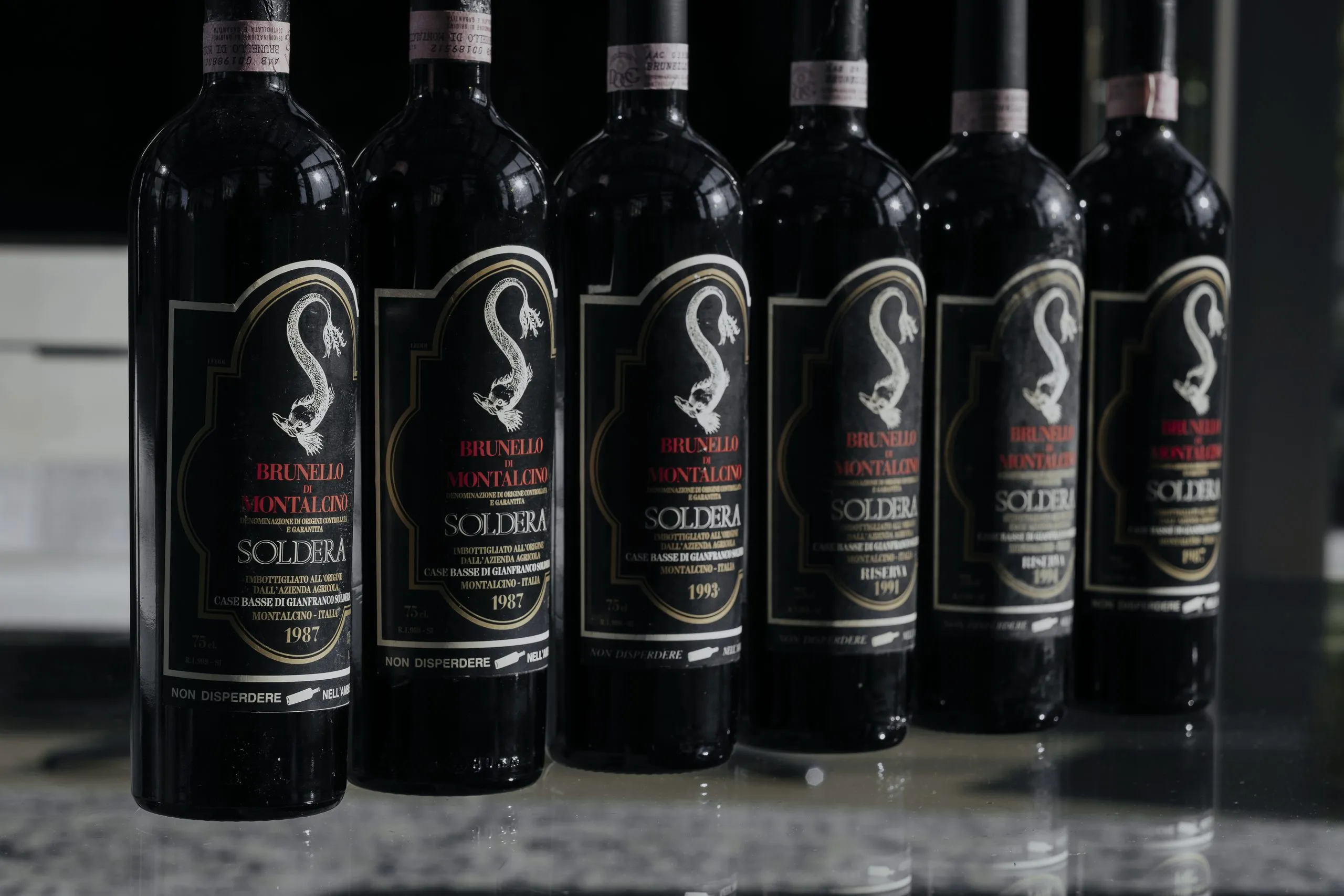 A row of Brunello di Montalcino Soldera bottles, vintages 1987 to 1993